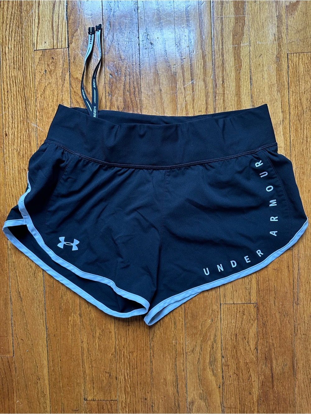 Under Armour Black Women’s Athletic Shorts with White Trim Heatgear Fitted